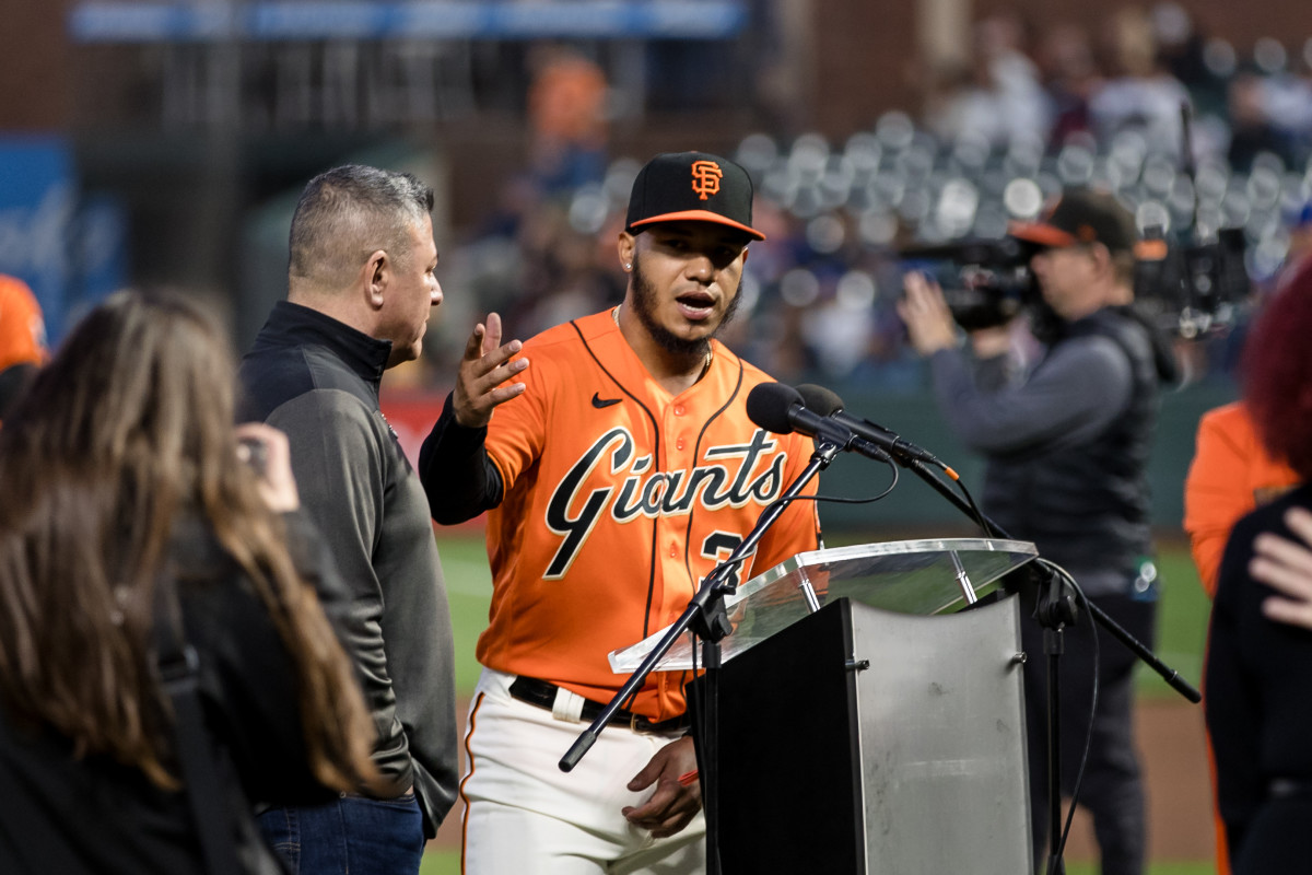 SF Giants second baseman Thairo Estrada (39) addresses the crowd after winning the WIllie Mac award before the game against the Los Angeles Dodgers at Oracle Park.